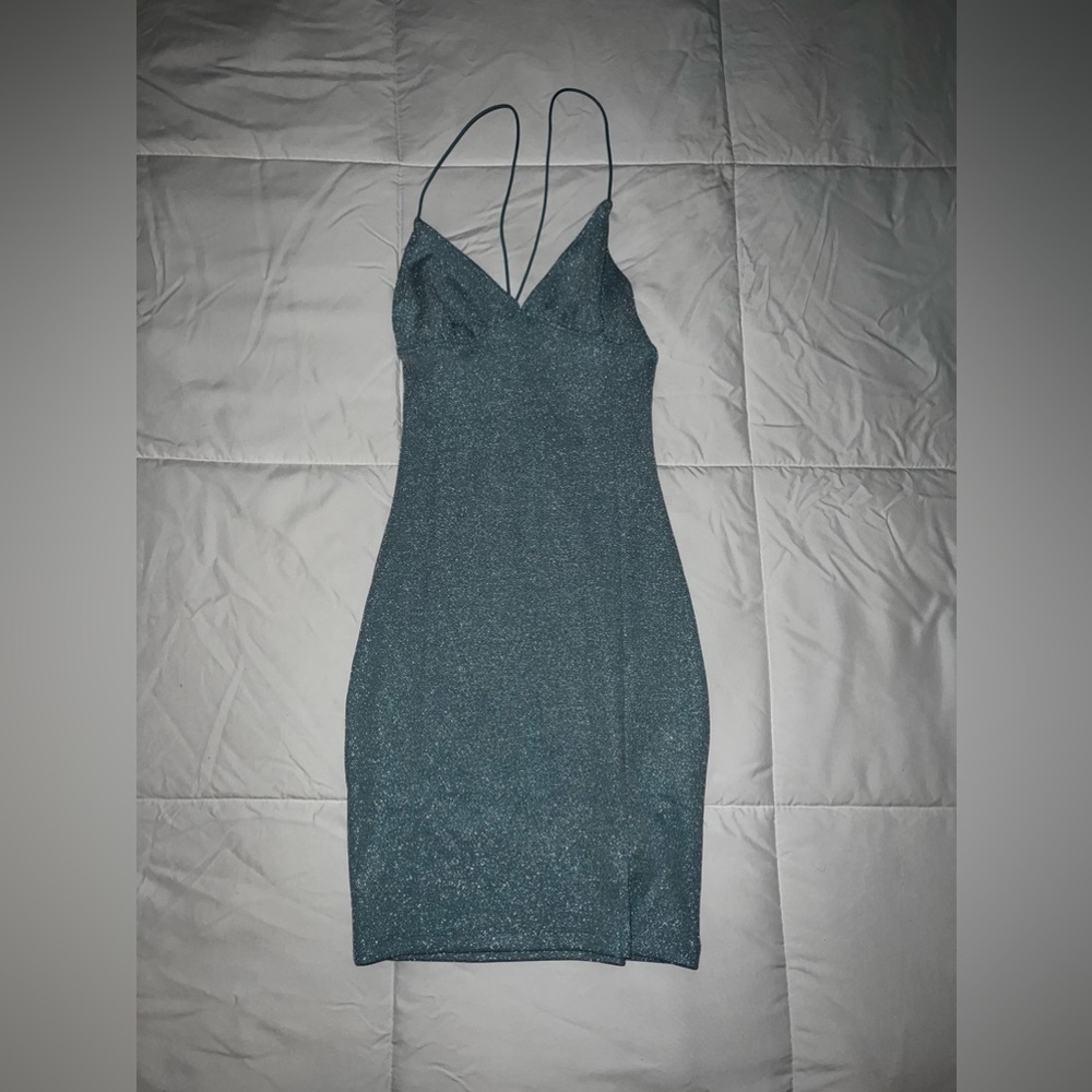 Sparkly blue and silver H&M mini dress with back open.